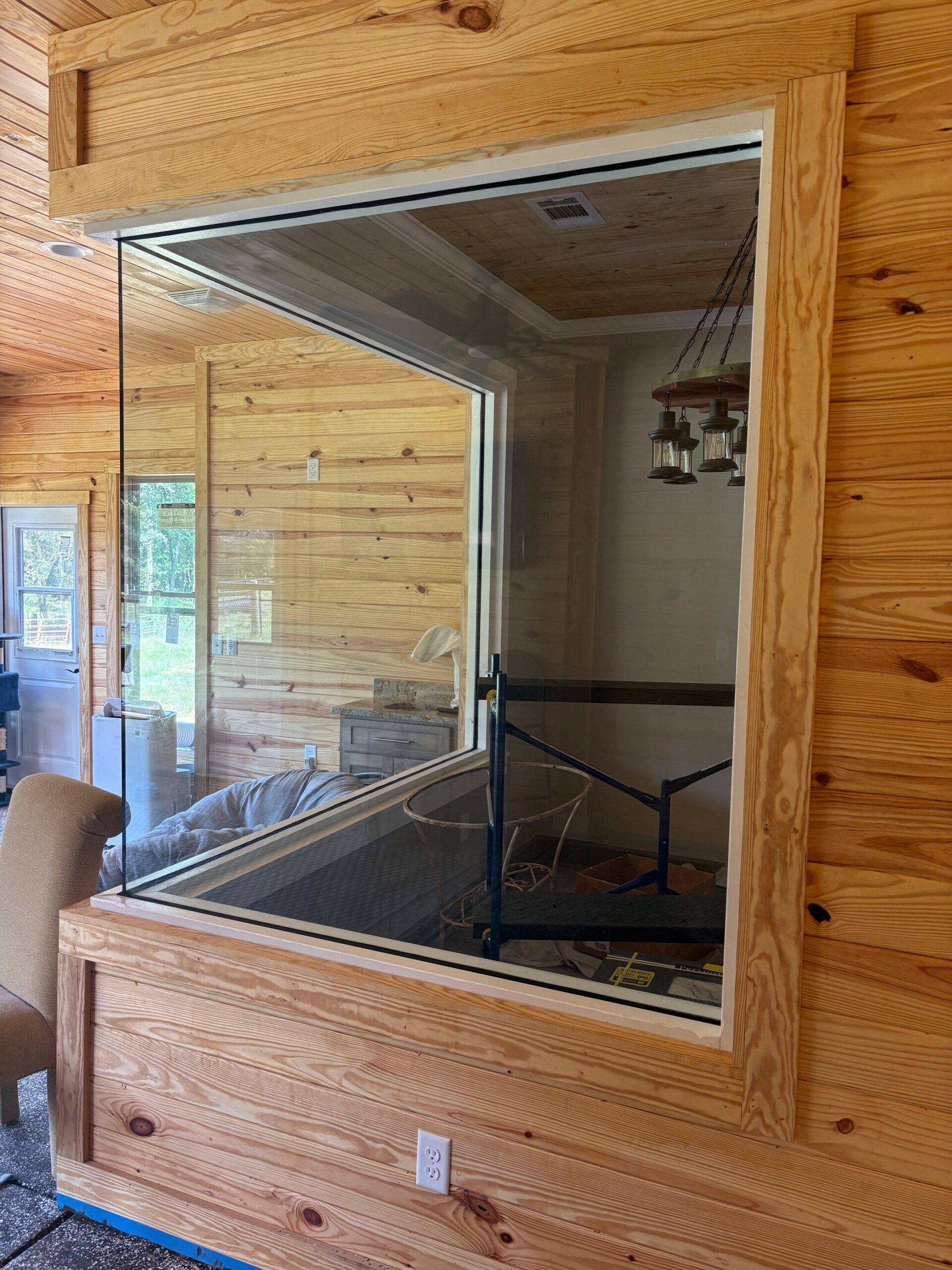 Frameless Glass porch adds a clear view of the backyard, installed by Independent glass
